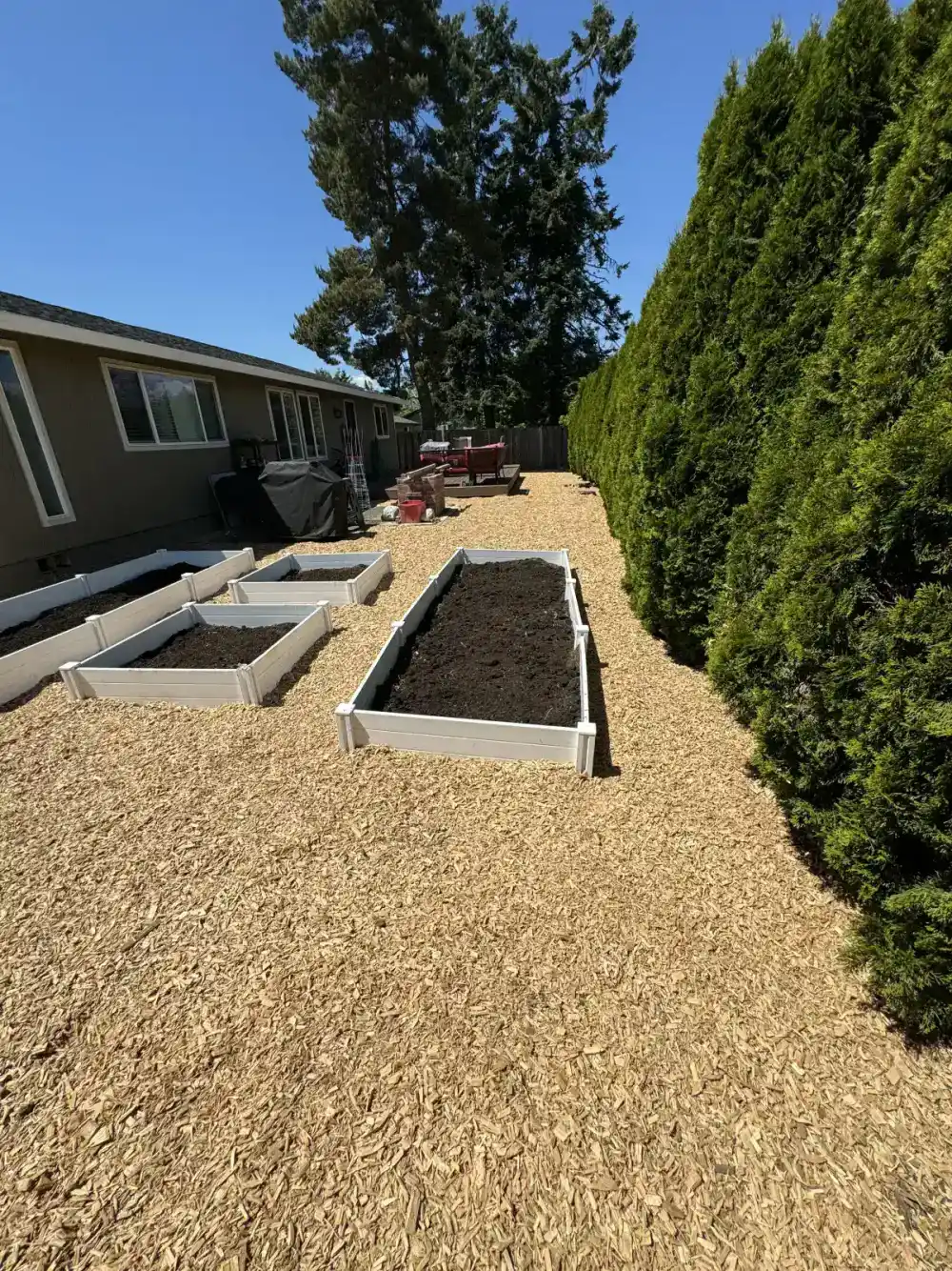 Fresh mulch installation in landscape beds