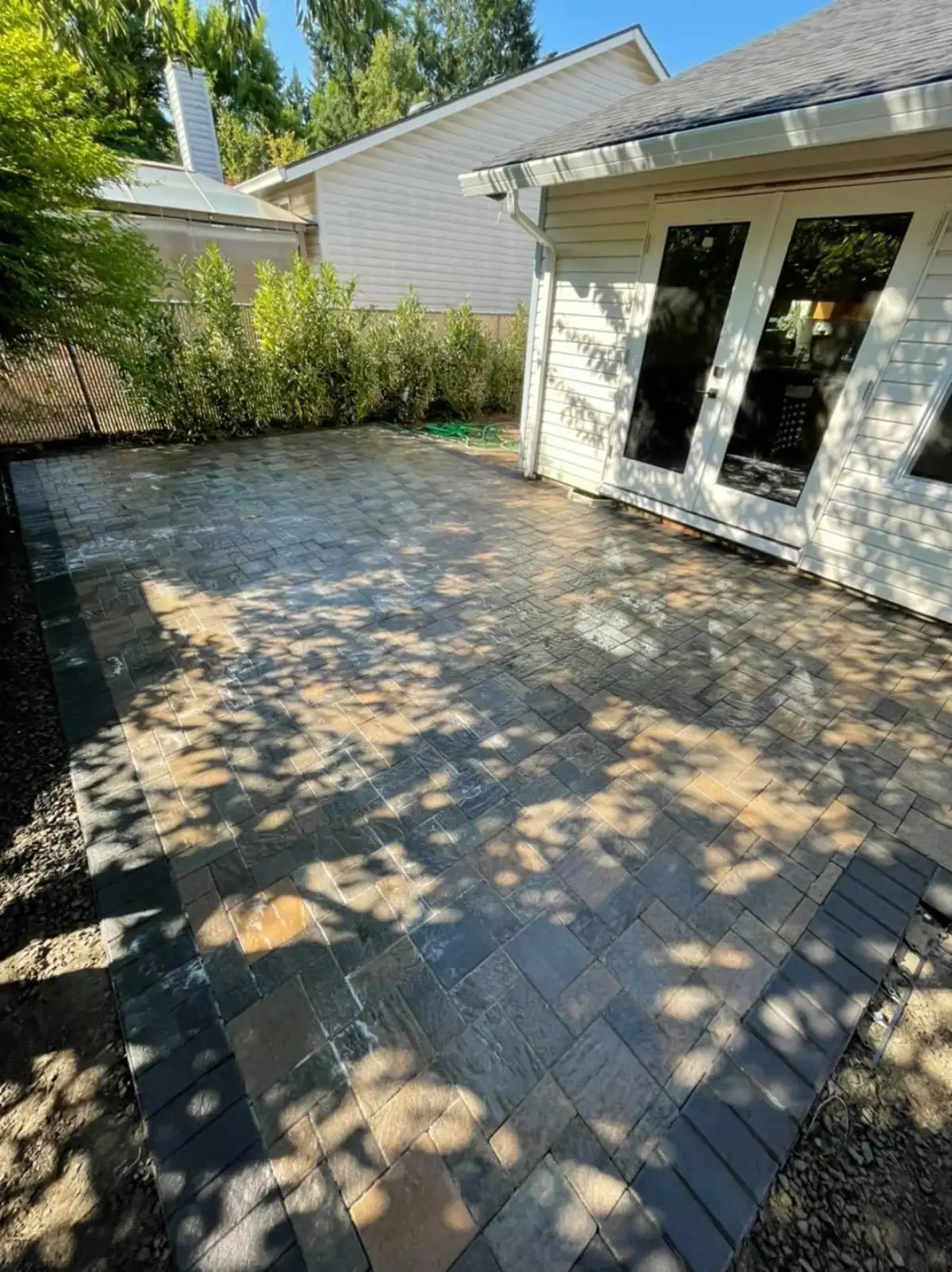 Paver walkway and steps leading to backyard in Tualatin Oregon